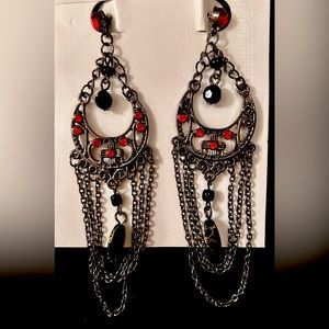 Black chains and red beads.